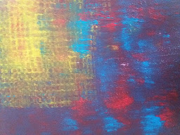 Colourful lights reflected on water at night
